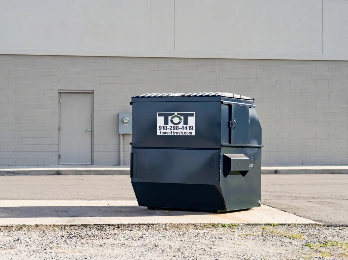 8-yard Tons of Trash front-load commercial dumpster