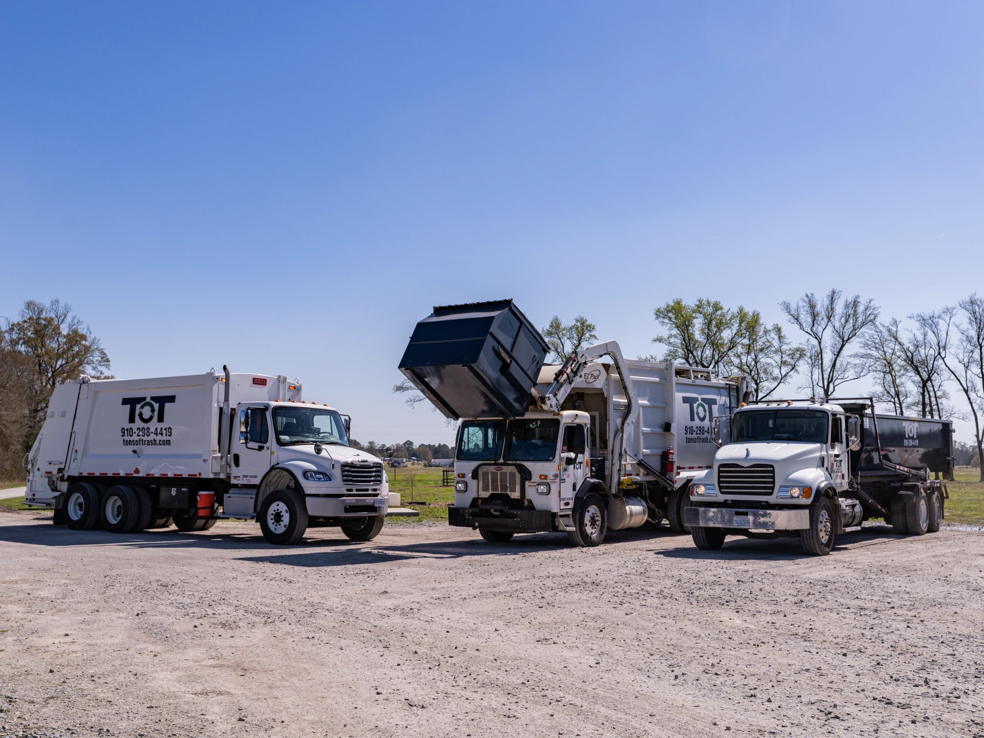 Tons of Trash fleet of trucks lined up in eastern North Carolina